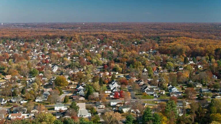 Aerial shot of a residential neighborhood in Bowie, a city in Prince George's County, Maryland on a sunny day in Fall.